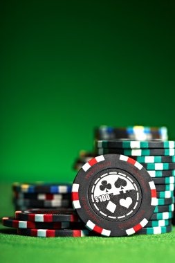 Live Asia Gaming dealer studio showing Andar Bahar card setup